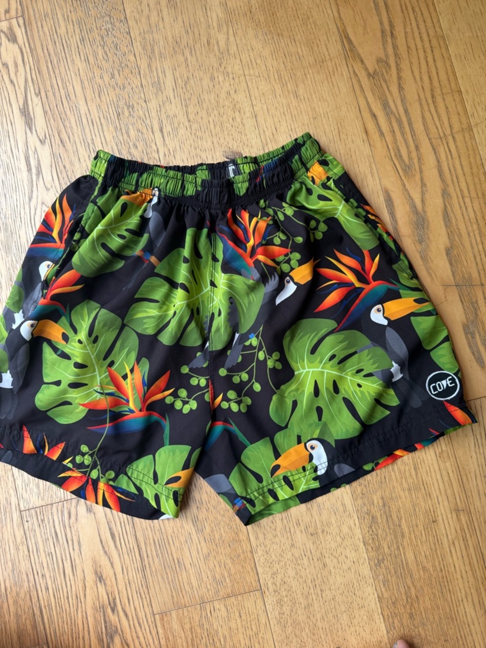 Cove Black Swim Trunks with Green Tropical Toucan Print